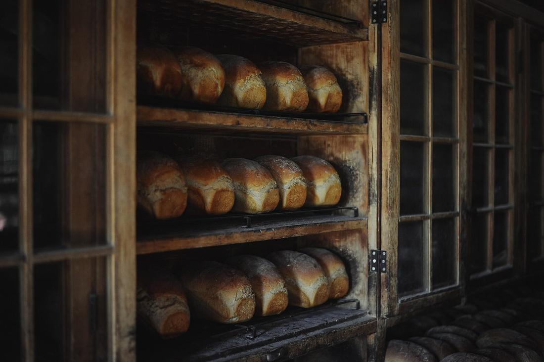 Loaves on old wooden shelves