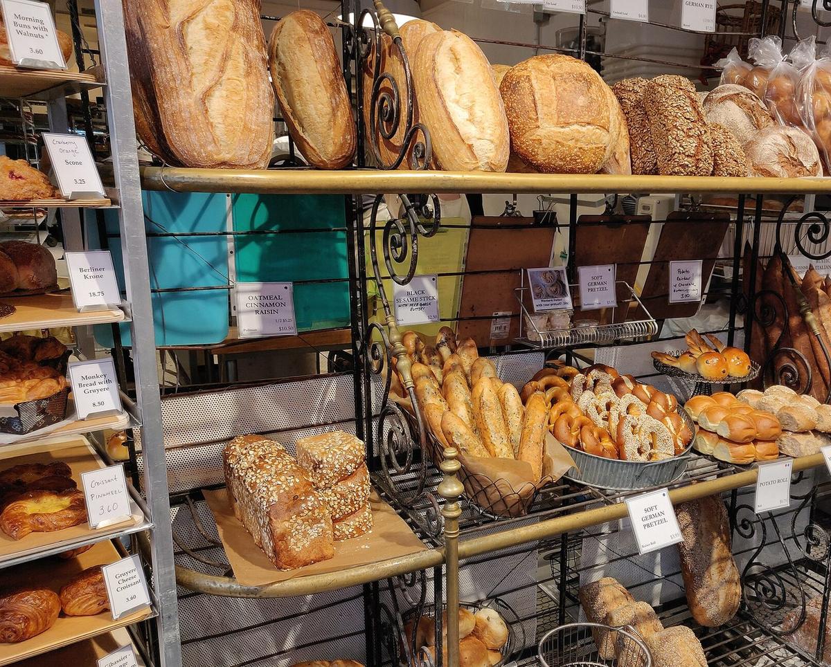 Bakery shelves full of loaves